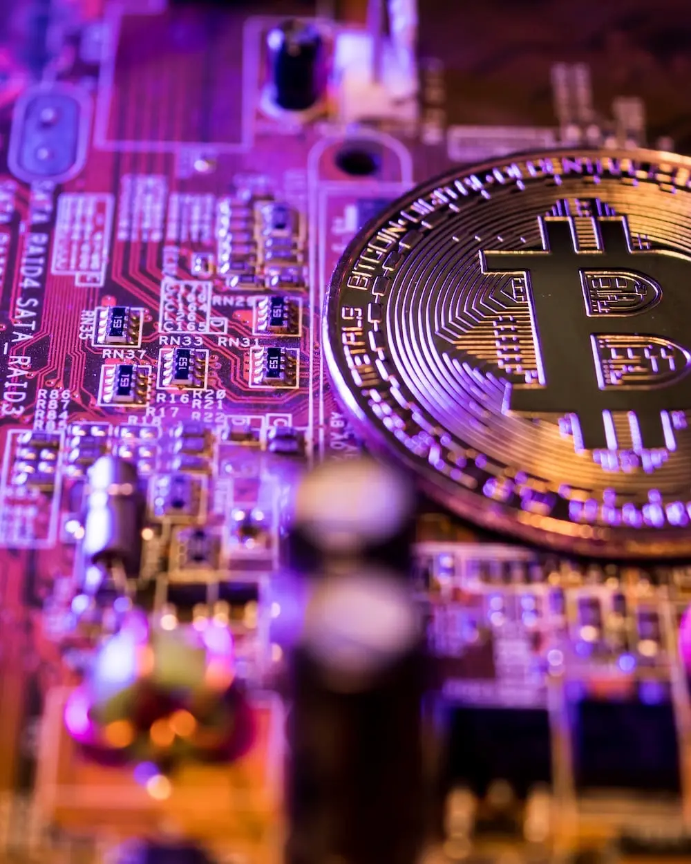 Crypto coin on circuit board